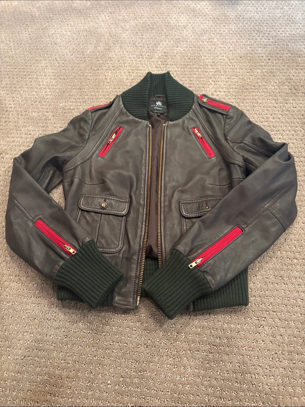 Rock & Republic Olive Green Leather Bomber Jacket with Red Zipper Accents